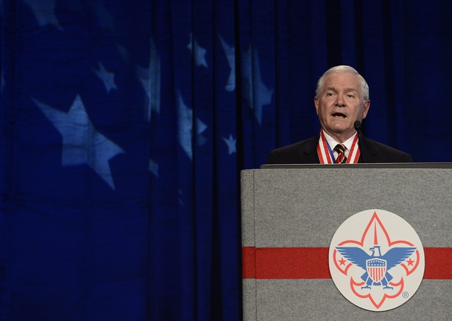 In this Friday, May 23, 2014 file photo, former Defense Secretary Robert Gates addresses the Boy Scouts of America's annual meeting in Nashville, Tenn., after being selected as the organization's new president.
