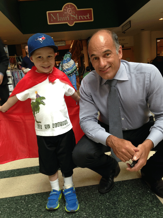 Owen Veloso on his sixth birthday with his SickKids surgeon Dr. Christopher Caldarone.