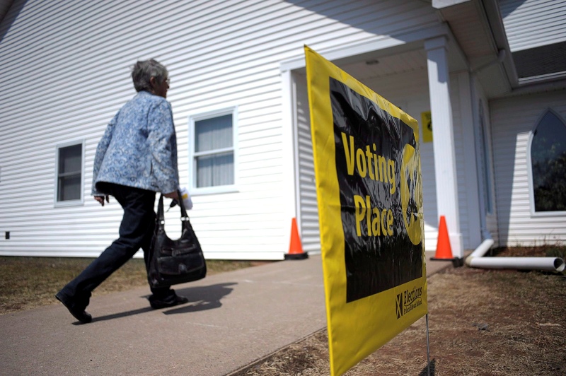 A voter heads into a polling station in Charlottetown, P.E.I. on Monday, May 4, 2015. 