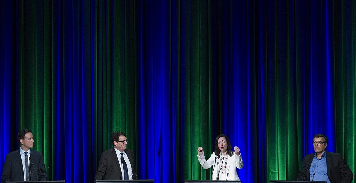 Parti Québécois leadership candidates, from left, Alexandre Cloutier, Pierre Karl Péladeau, Martine Ouellet and Pierre Céré participate in the final debate in Montreal, Thursday, May 7, 2015.