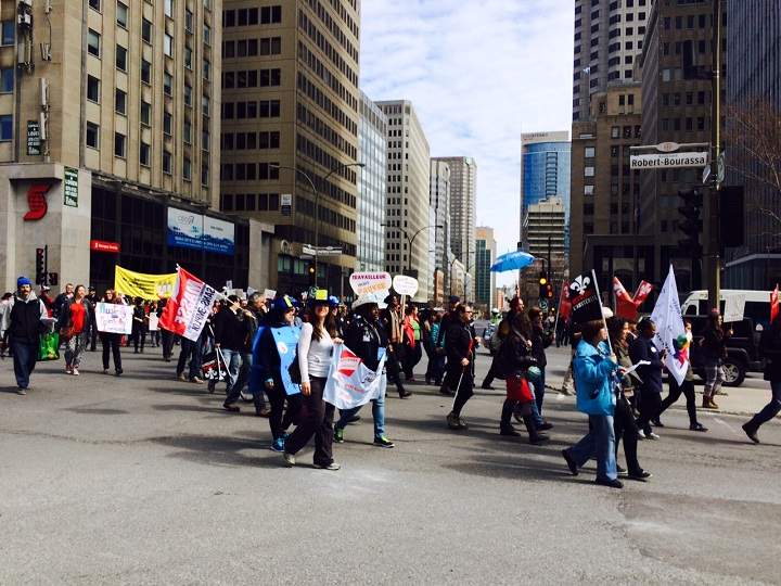 Thousands of demonstrators have taken to the streets of Montreal and elsewhere in the province to mark International Workers Day on May 1, 2015.