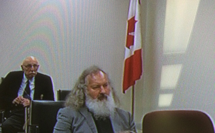 Actor Randy Quaid, in this image shot off of a closed circuit TV monitor, appears at an immigration refugee board hearing in Montreal on Tuesday, May 19, 2015. 