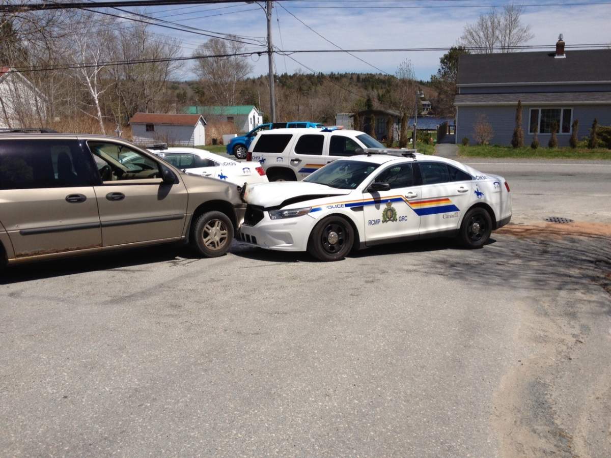 Three suspects were arrested after a van being pursued by police spun out of control and collided with two cruisers in Lake Echo on Thursday.