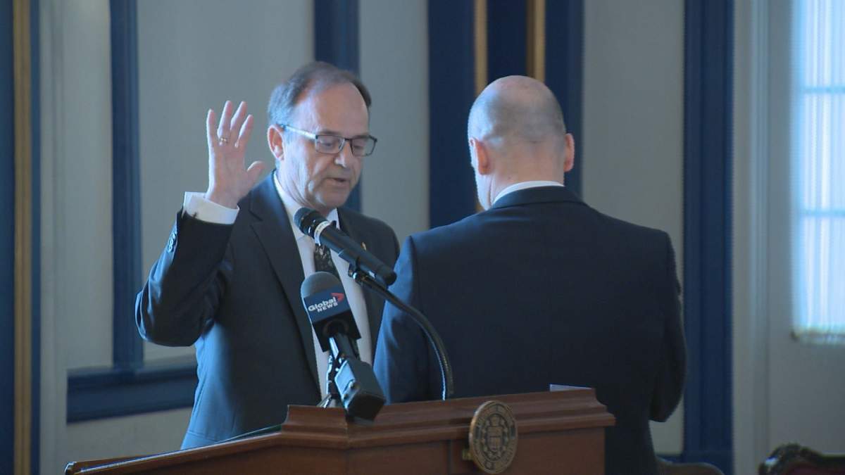 Moments after being sworn in, Saskatchewan’s new Environment Minister Herb Cox wasn’t willing to take a clear stance on global warming.