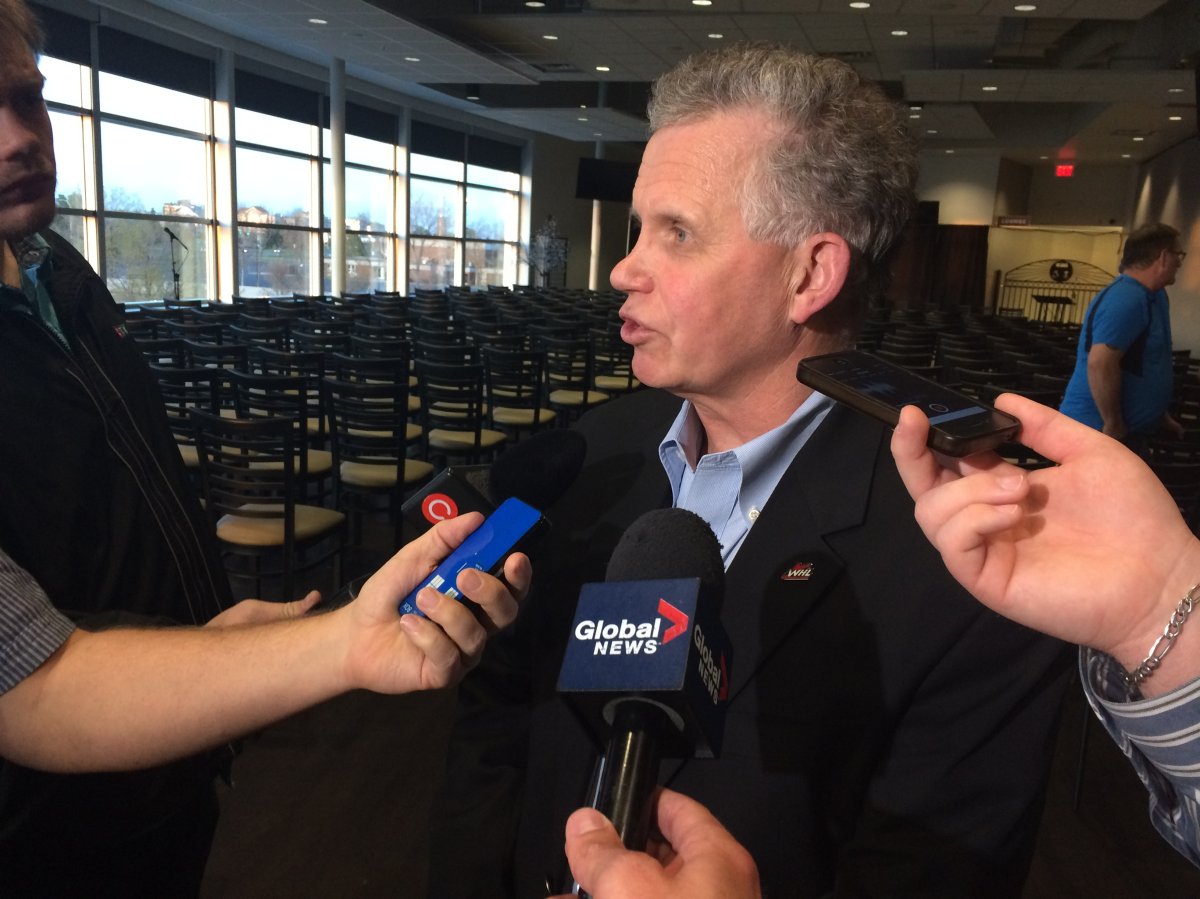 WHL commissioner Ron Robison talks the media following his address to Lethbridge Hurricanes shareholders.