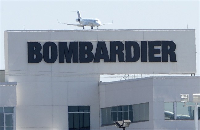 A plane comes in for a landing at a Bombardier plant in Montreal in May.