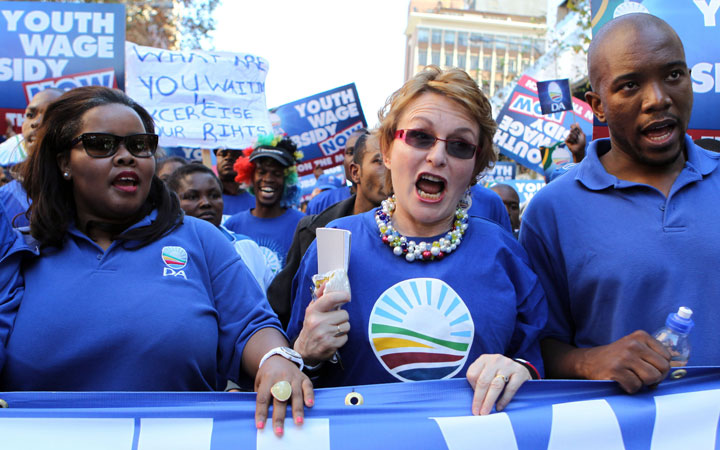 South Africa's opposition party Democratic Alliance (DA) former leader Helen Zille, centre, with parliamentary leader Lindiwe Mazibuko, left,  and new leader Mmusi Maimane, right,  lead their supporters during their protest march against the Congress of South African Trade Unions (Cosatu) for opposing the youth wage subsidy in Johannesburg, South Africa on Tuesday May 15, 2012.