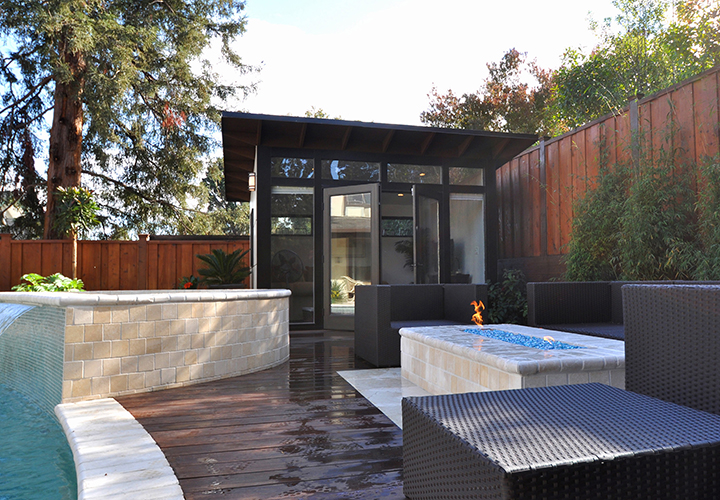 This photo provided by Studio Shed shows how one homeowner used a shed to enhance the backyard and create additional space for entertaining and outdoor living in San Carlos, Calif.