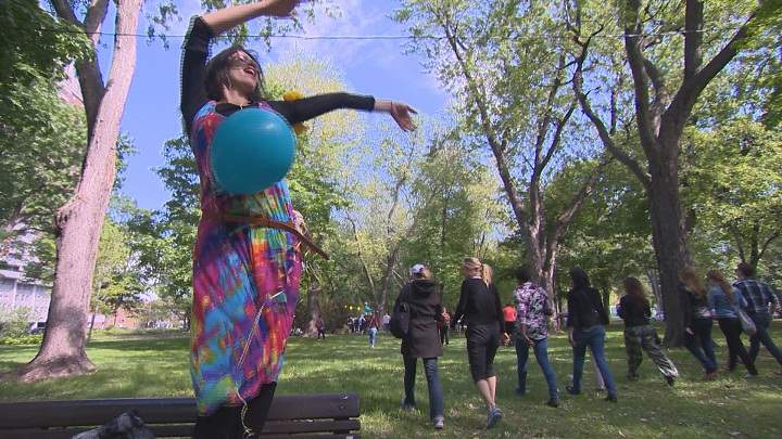Montrealers groove to the beat at silent disco in Park Lafontaine. Sunday, May 23, 2015