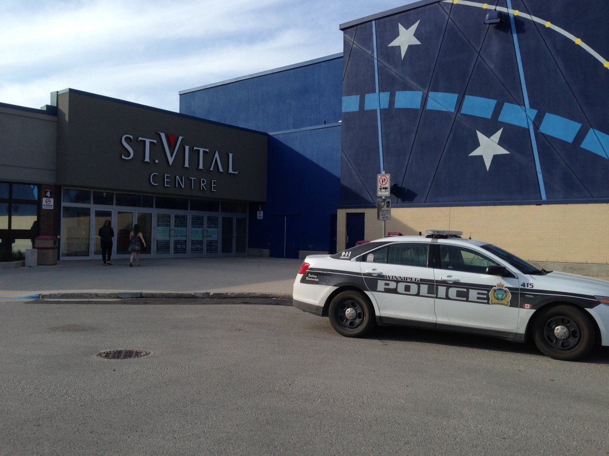 A police unit sits outside the St. Vital Shopping Centre after the popular shopping destination was evacuated late Wednesday afternoon. 