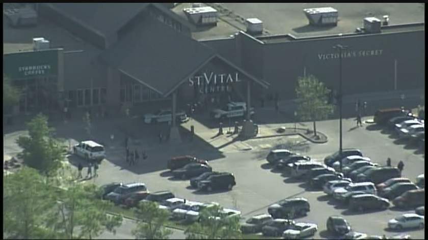 St. Vital Mall evacuated by multiple police units.