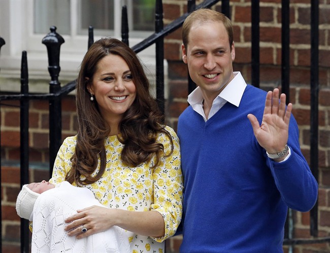 In this Saturday, May 2, 2015. file photo, Kate Duchess of Cambridge and Prince William smile as they carry their newborn baby princess from The Lindo Wing of St. Mary's Hospital, in London Britain's newborn princess has been named Charlotte Elizabeth Diana it was announced on Monday May 4.