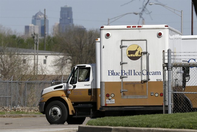 FILE -In this April 10, 2015 file photo, Blue Bell delivery trucks are parked at the creamery's location in Kansas City, Kansas. Blue Bell ice cream had evidence of listeria bacteria in its Oklahoma manufacturing plant as far back as March 2013, a government investigation released Thursday says. The company then continued to ship ice cream produced in that plant after what the Food and Drug Administration says was inadequate cleaning.