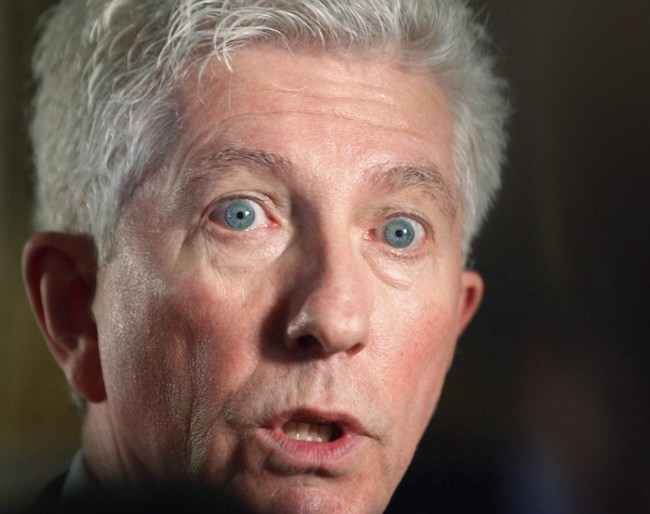 Former Bloc Quebecois leader Gilles Duceppe talks to the media after appearing before the Commons Board of Internal Economy on Parliament Hill in Ottawa, Monday February 13, 2012. Duceppe is set to take the reins of the party.