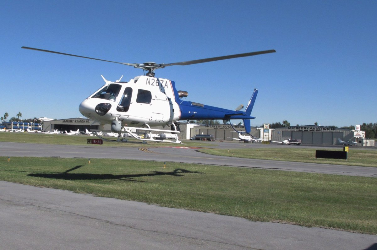 In this Nov. 27, 2013 photo, a U.S. Customs and Border Protection helicopter returns from patrol at the agency's Office of Air and Marine in McAllen, Texas.