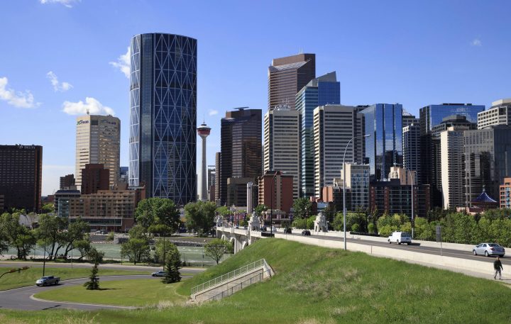 Downtown Calgary with the Centre Street Bridge and Bow River in the foreground at Calgary, Alberta on June 10, 2014.  