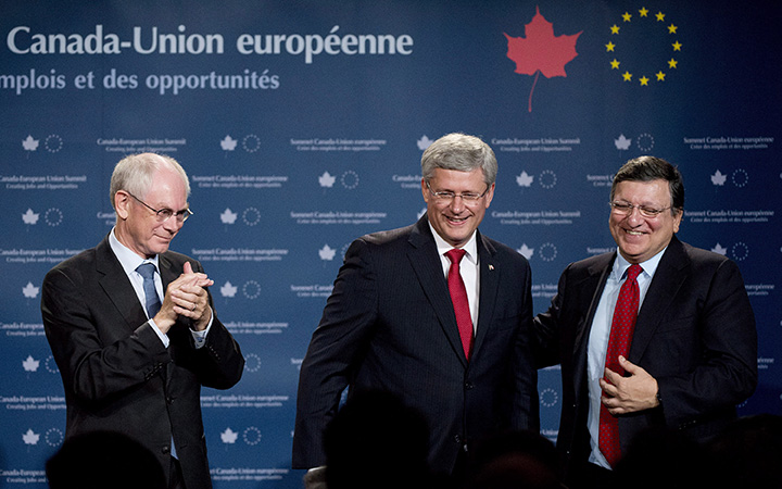 Prime Minister Stephen Harper, centre, smiles with Herman Van Rompuy, left, President of the European Council, and Jose Manuel Barroso, right, President of the European Commission at the Canada-European Union Summit in Toronto on Friday, September 26, 2014.