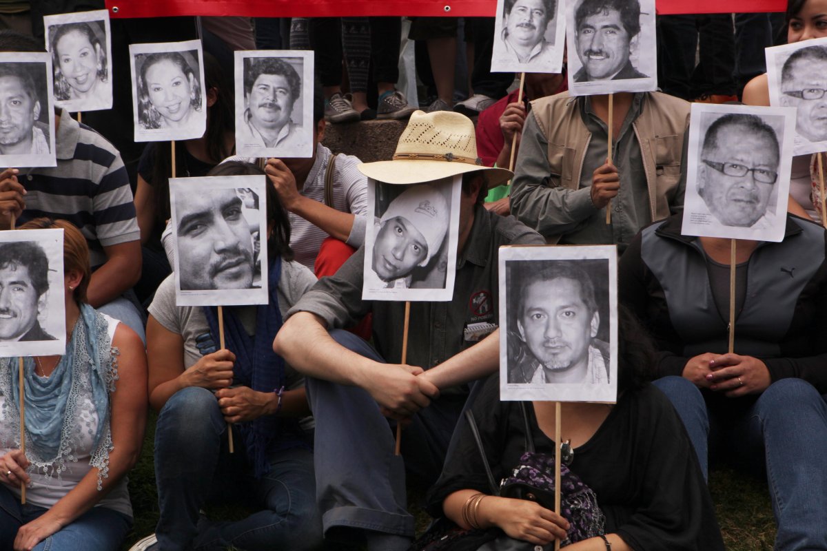 Journalists protest the murders of slain colleagues in Mexico City on Feb. 23, 2014.