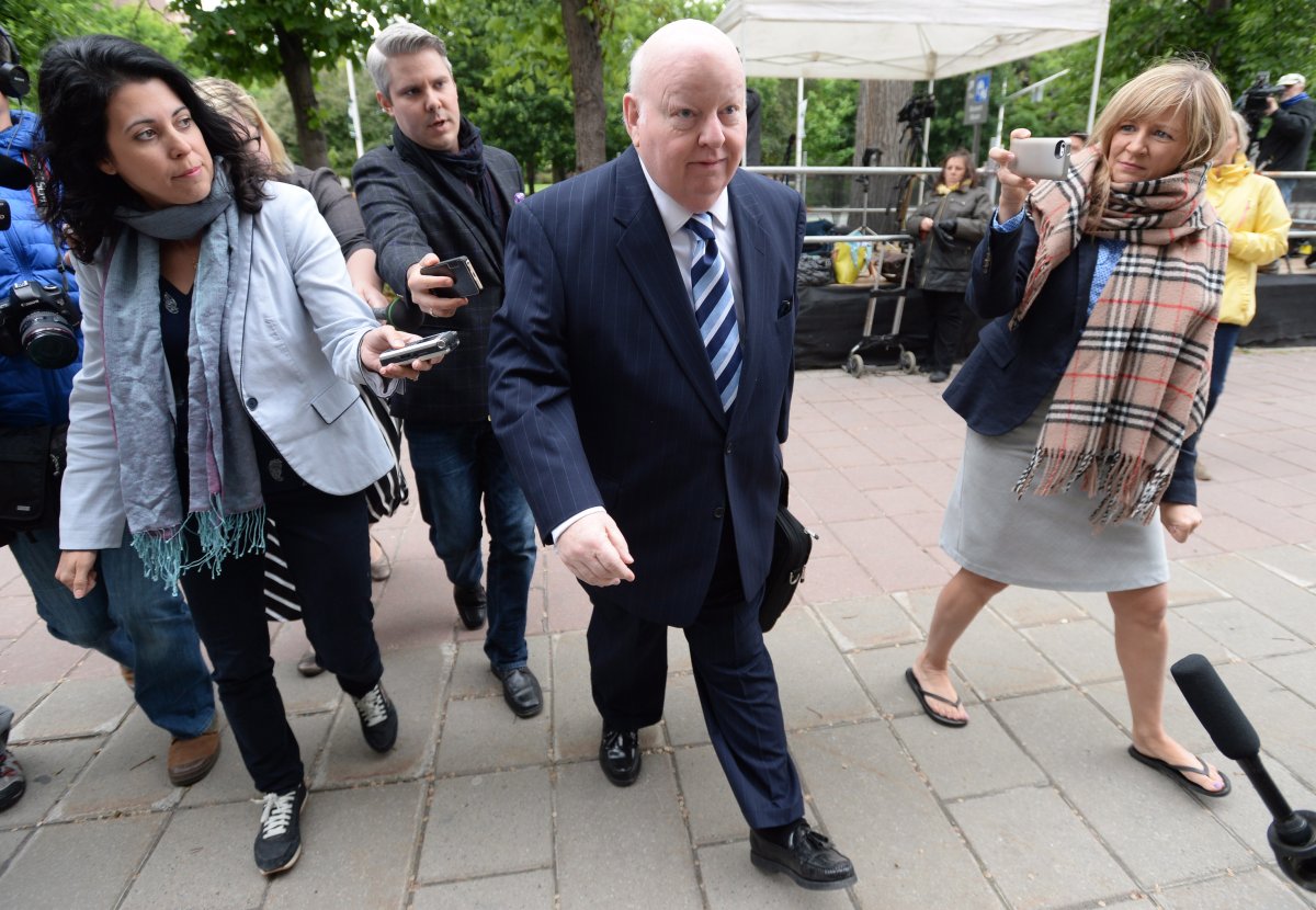 Suspended Senator Mike Duffy heads to court in Ottawa on Monday, June 1, 2015. 