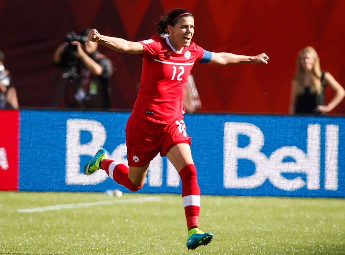 Canada's Christine Sinclair celebrates her game-winning stoppage-time penalty shot goal against China during FIFA Women's World Cup soccer action in Edmonton, Alta., Saturday, June 6, 2015.