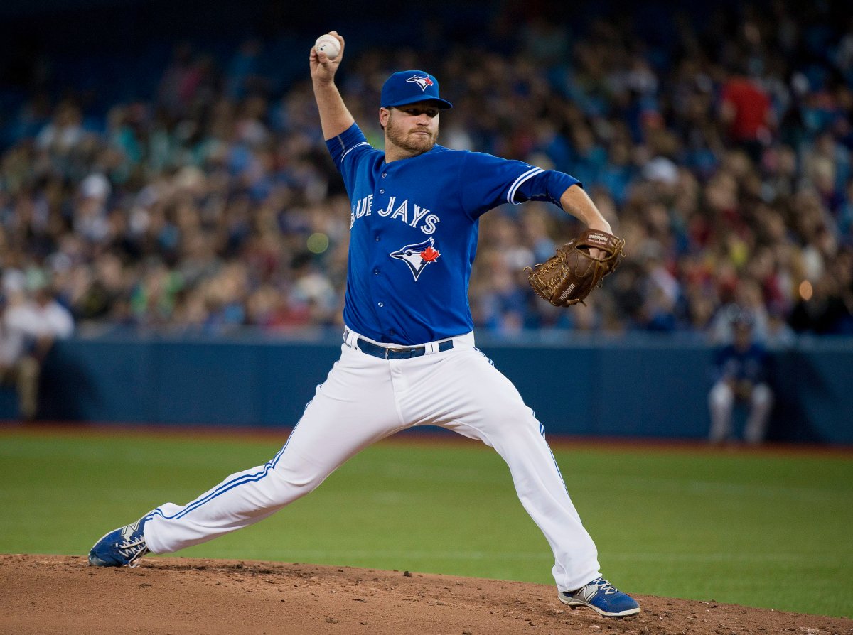 Toronto Blue Jays starting pitcher Scott Copeland makes his major league debut as he works against the Miami Marlins during second inning interleague baseball action in Toronto on Wednesday, June 10, 2015. 