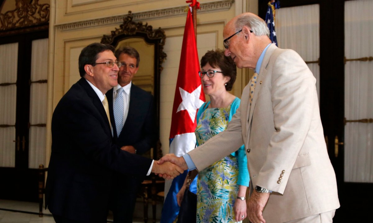 Cuba's Foreign Minister Bruno Rodriguez Parrilla, left,  Sen. Pat Roberts, R-Kan, at the Foreign Ministry in Havana, Cuba, Saturday, June 13, 2015. Also pictured are Sen. Jeff Flake, R-Ariz, second left, and Sen. Susan Collins, R-Maine.