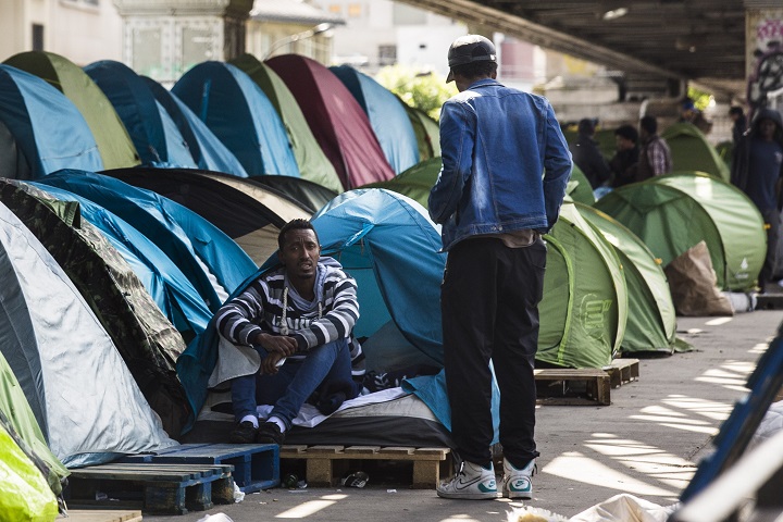 Illegal migrants are seen at an unauthorized migrant camp under the tracks of the Paris Metro Line 2 on Boulevard de la Chapelle in Paris, France on June 01, 2015. 
