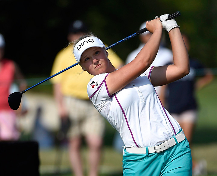 Brooke Henderson hits from the sixteenth tee during the final round of the KPMG Women's PGA golf championship at Westchester Country Club on Sunday, June 14, 2015, in Harrison, N.Y. 