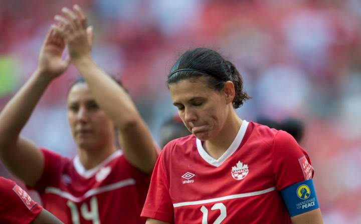 Canada's Christine Sinclair reacts to her teams 2-1 lose to England following the second half of FIFA World Cup quarter-final soccer in Vancouver, B.C. Saturday, June, 27, 2015. 