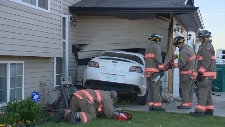 Speeding Saskatoon driver smashes into garage after swerving to avoid a cyclist.