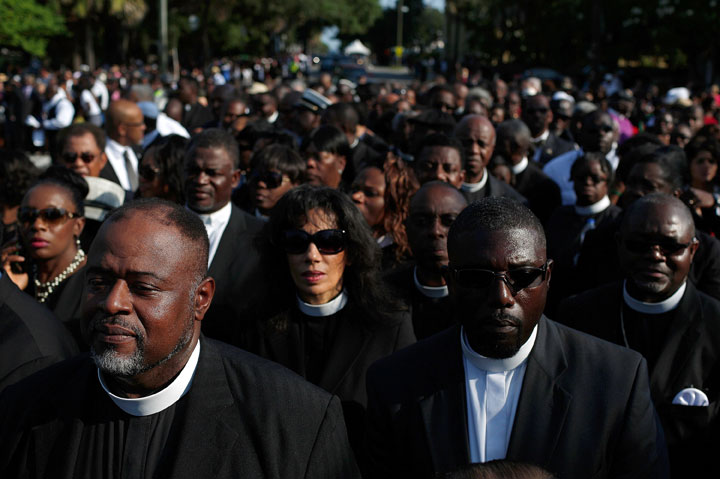 Members of the clergy wait to enter the funeral service where U.S. President Barack Obama will deliver the eulogy for South Carolina State senator and Rev. Clementa Pinckney who was killed along with eight others in a mass shooting June 26, 2015 in Charleston, South Carolina.