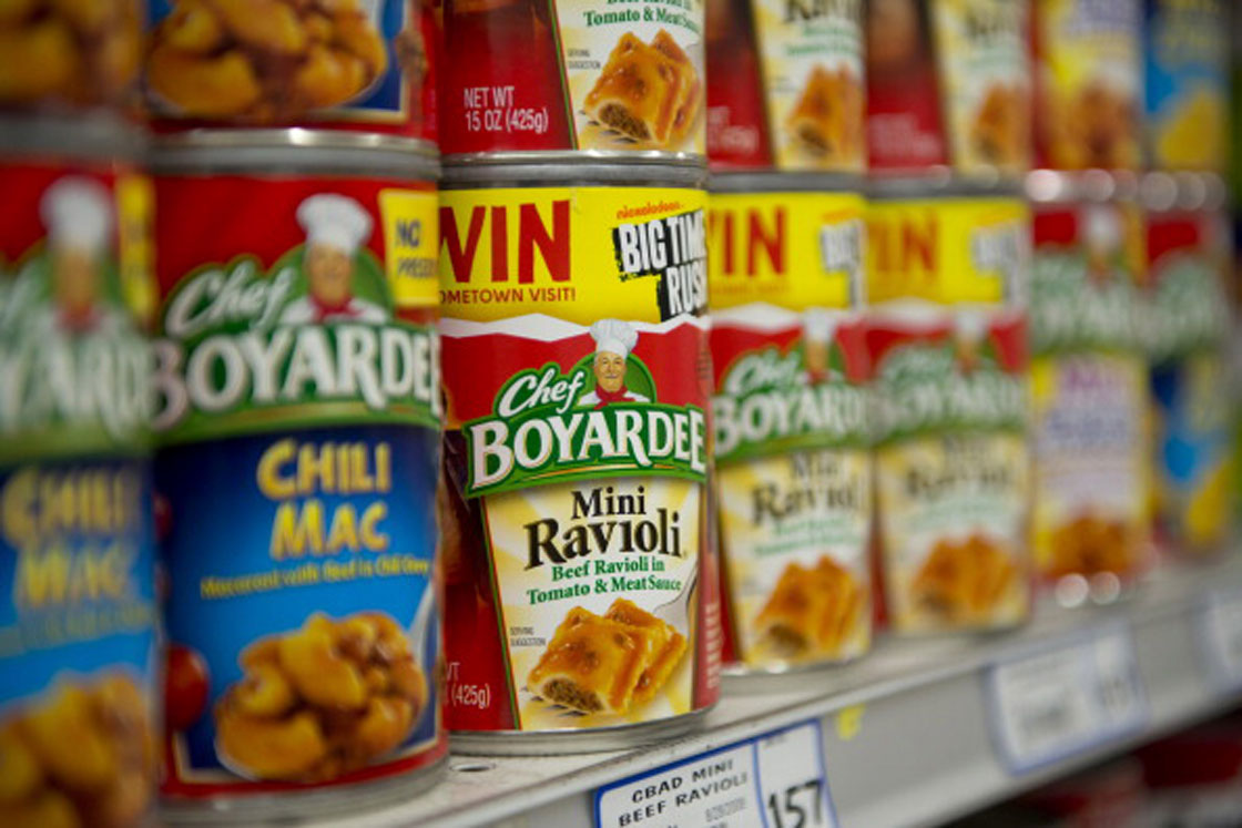 The maker of Chef Boyardee is dumping its store-brand unit to focus on national name brands -- but also organic and natural products.