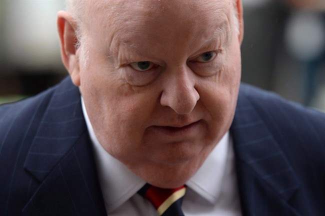 Suspended Senator Mike Duffy heads to court in Ottawa on Tuesday, June 2, 2015.