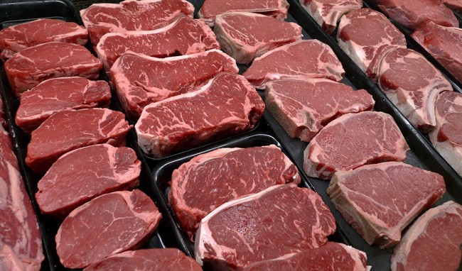 Steaks and other beef products are displayed for sale at a grocery store in McLean, Va., in this Jan. 18, 2010 file photo. House Republicans are hoping to repeal a law requiring country-of-origin labels on packages of meat to avoid costly trade retaliation from Canada and Mexico.