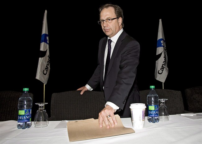 Steve Laut, president of Canadian Natural Resources Ltd., prepares to address the company's annual meeting in Calgary, Thursday, May 3, 2012. 