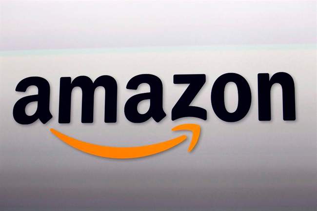 This Sept. 6, 2012 photo shows an Amazon logo at the introduction of the new Amazon Kindle Fire HD and Kindle Paperwhite personal devices, in Santa Monica, Calif. 