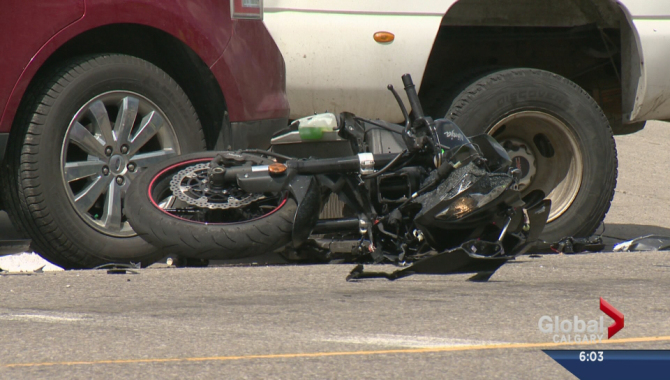A motorcyclist suffered life-threatening injuries after crashing into a car just before noon on Thursday, June 4, 2015 in southwest Calgary.