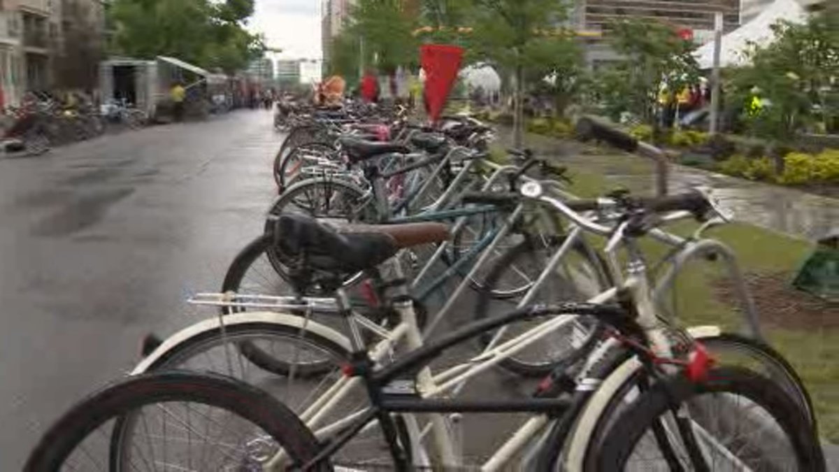Bikes lined the streets downtown Sunday, to show support for the city's newly opened cycle track.