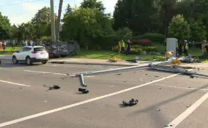 One cyclist is dead after being struck by a utility pole that was knocked over Monday evening in a collision between two vehicles in Vaughan, north of Toronto.