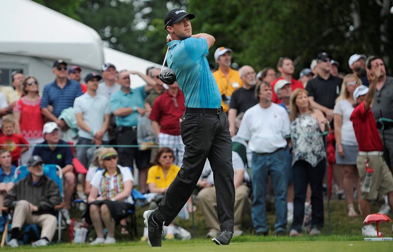 Graham DeLaet, of Canada, tees off on the first hole during the third round of the Travelers Championship golf tournament, Saturday, June 27, 2015, in Cromwell, Conn.