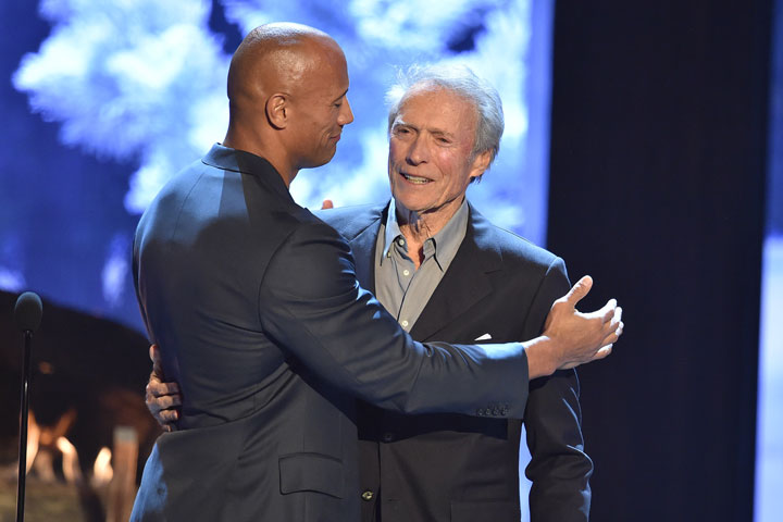 Dwayne Johnson greets Clint Eastwood at the Guys' Choice 2015 awards on June 6, 2015.
