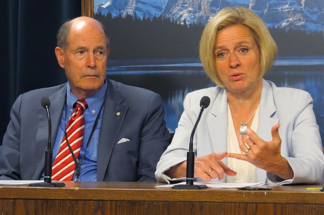 Alberta Premier Rachel Notley and David Dodge announce to reporters at the legislature Friday, June 19, 2015 that Dodge, the former governor of the Bank of Canada, has been hired to advise the province on its infrastructure plan. Dodge will bring forward recommendations for the government to use in its October budget. 