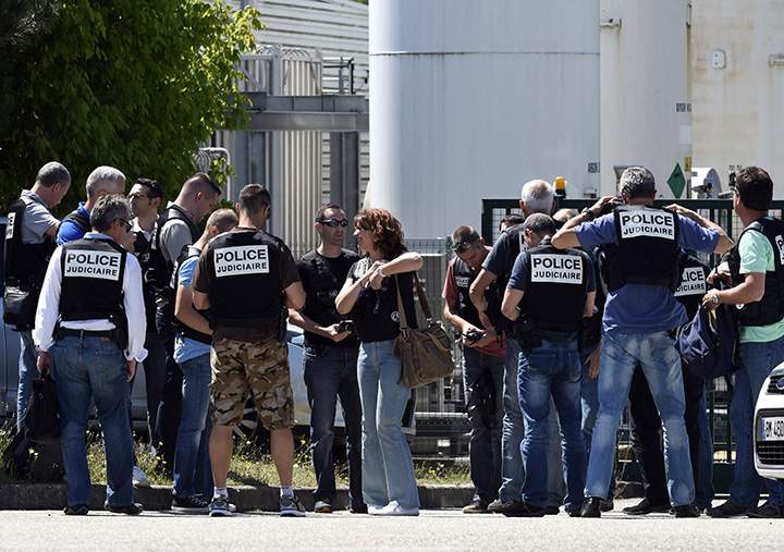 French police secure the entrance of the Air Products Company in Saint-Quentin-Fallavier, near Lyon, central eastern France, on June 26, 2015.