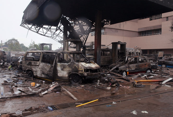 The remaining structure of a gas station after it exploded in Accra, Ghana, Thursday, June 4, 2015. 