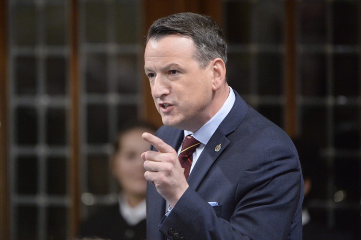 Natural Resources Minister Greg Rickford answers a question during Question Period in the House of Commons in Ottawa on Thursday, Feb. 26, 2015.