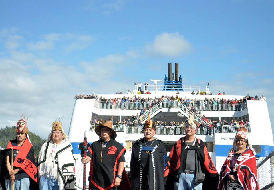 Hereditary Haida leaders disembark at Bella Bella, B.C.