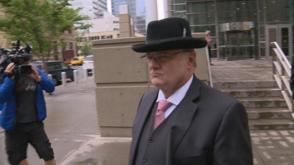 Stephen Laurence Huggett leaves the Calgary Courts Centre. 