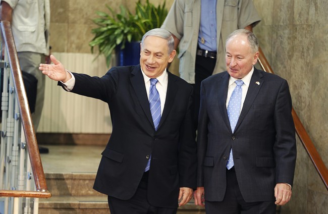 Israel's Prime Minister Benjamin Netanyahu and Canada's Foreign Minister Rob Nicholson, arrive to deliver statements after their meeting in Jerusalem Wednesday, June 3, 2015.