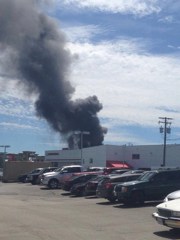 UPDATE: Fire crews extinguish large fire burning at Surrey plastics plant - image