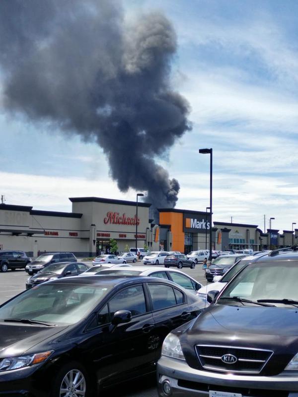 UPDATE: Fire crews extinguish large fire burning at Surrey plastics plant - image